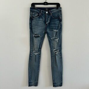 AMIRI Distressed Button Fly Skinny Jean